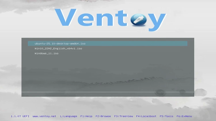 Ventoy boot menu listing three ISO files, ubuntu-25.10-desktop-amd64.iso, Win10_22H2_English_x64v1.iso, and Windows_11.iso, ready to select and boot